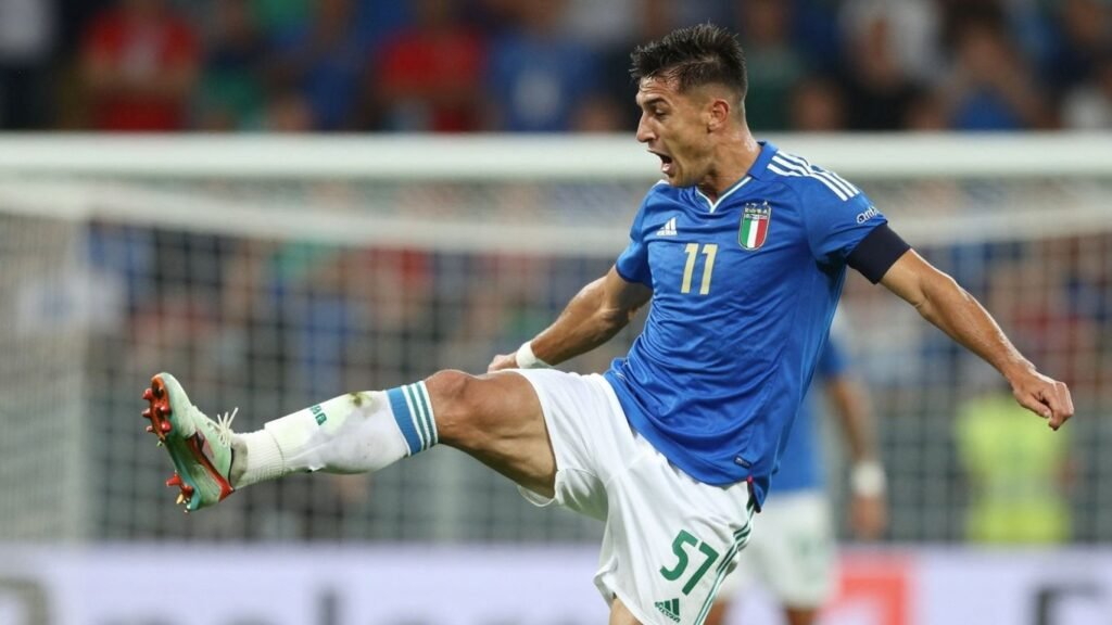 Italian football player in action on the pitch.